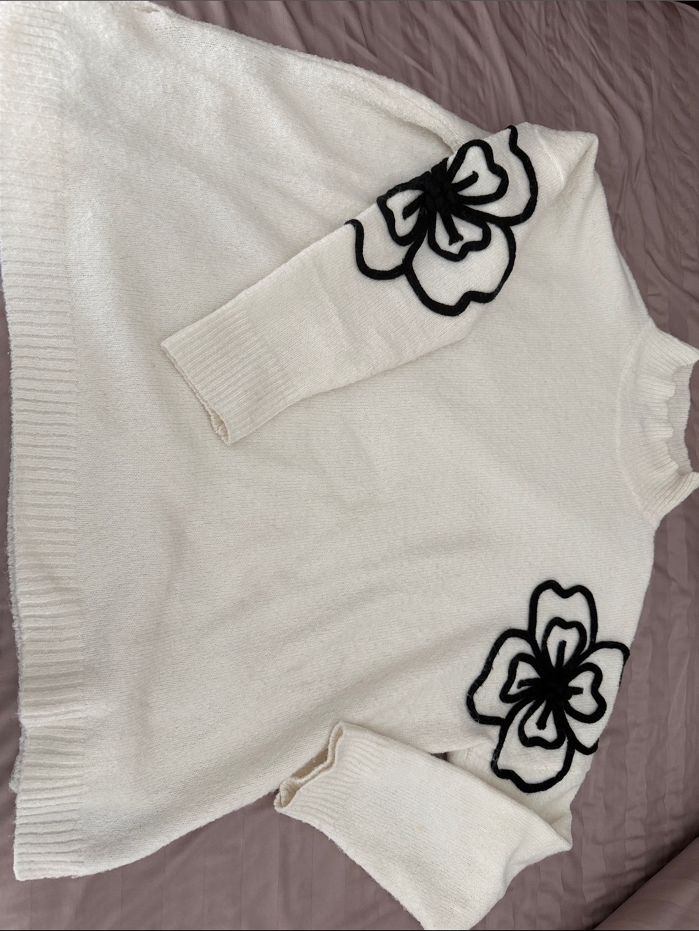 Staccato Cream Knit Sweater with Black Floral Appliqué